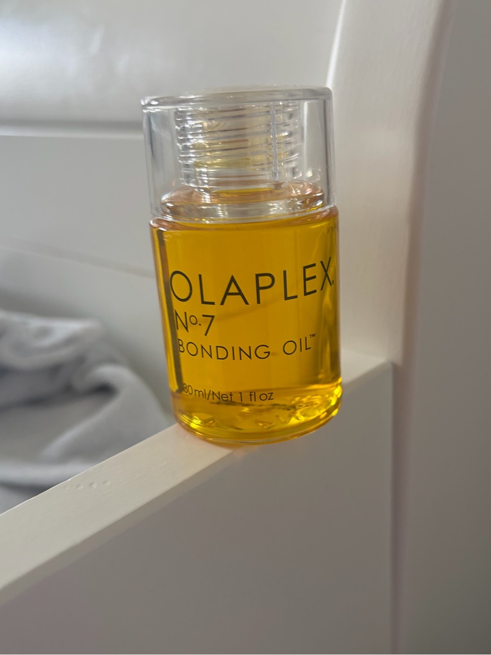 OLAPLEX No.7 Bonding Oil — Clear Bottle with Yellow Oil